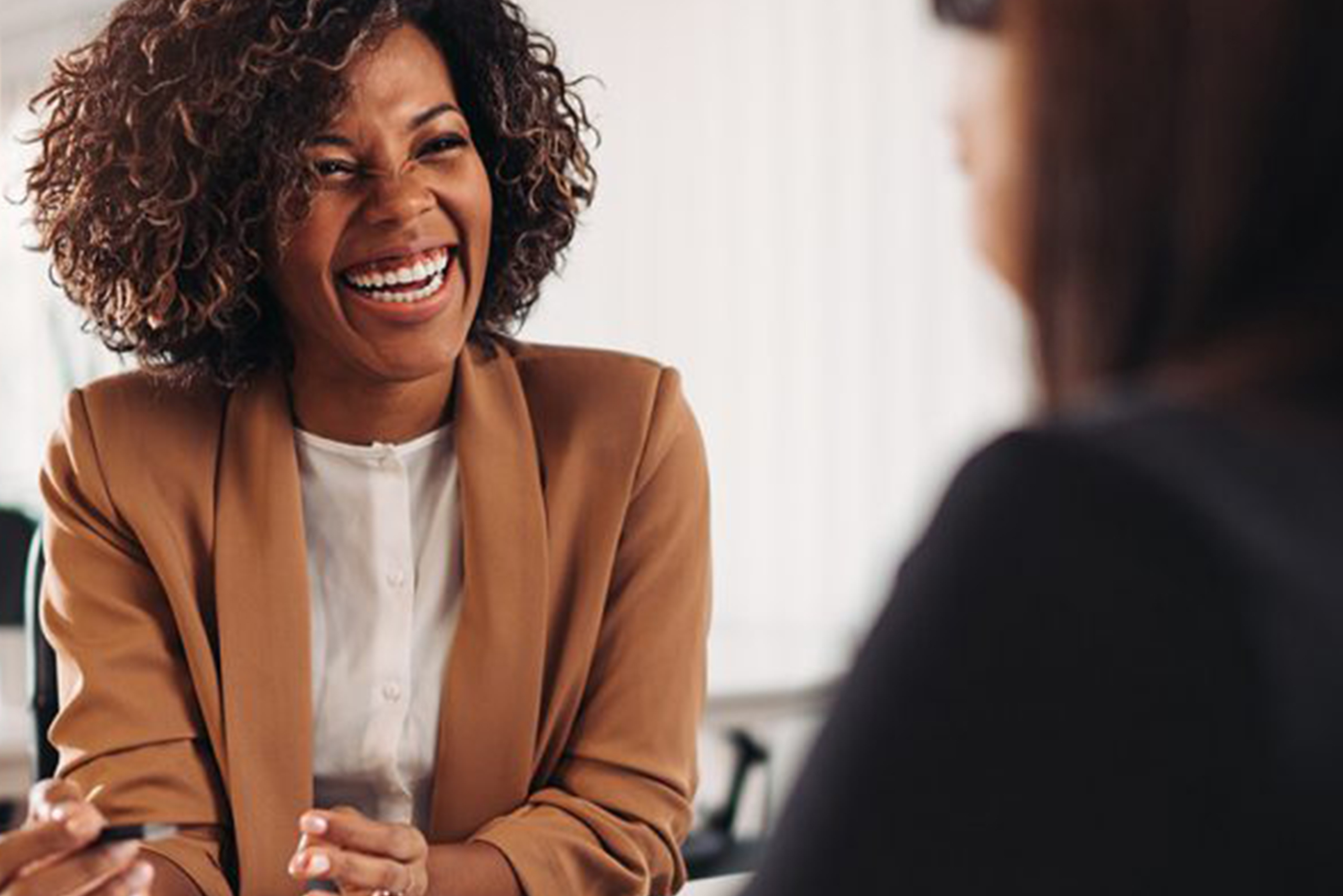 Someone laughing during a conversation